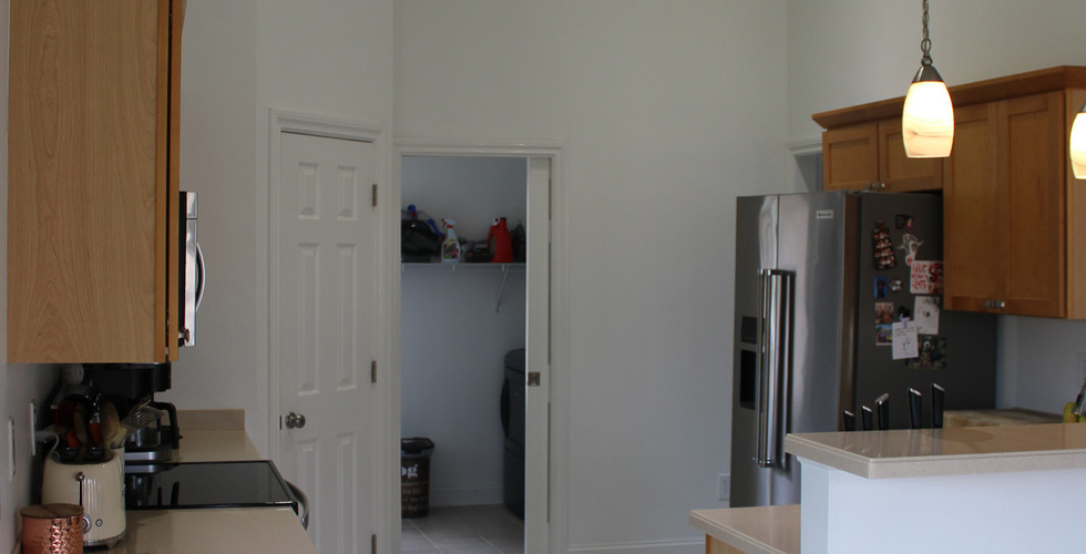 Narrow entry into former kitchen