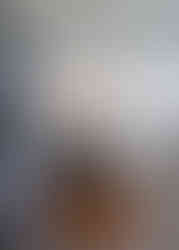 Entry into masterfully lit kitchen and shining wood floors