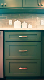 Full overlay 3-drawer cabinet in Green Kitchen by Barrett Home Renovations