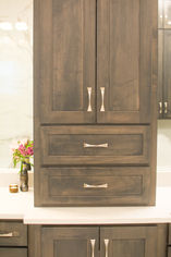 The tower above bump out with inset doors and drawers