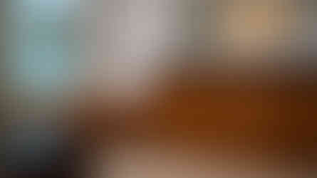 Wood 'L'-shaped bench and double vanity in stained maple wood