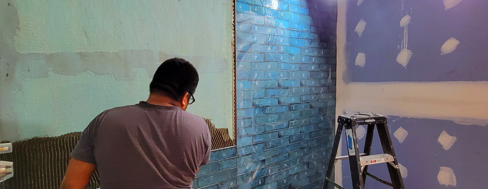 Walls being mudded for tiles