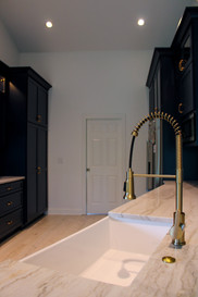 Taj Mahal quartzite counter and under mount skirted sink on full display