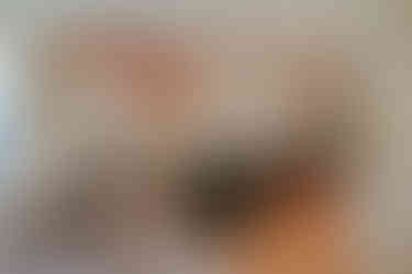 Custom Grand Kitchen in galley layout with eat-in area