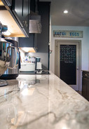 Veining of granite countertops in The Modern Farm House kitchen