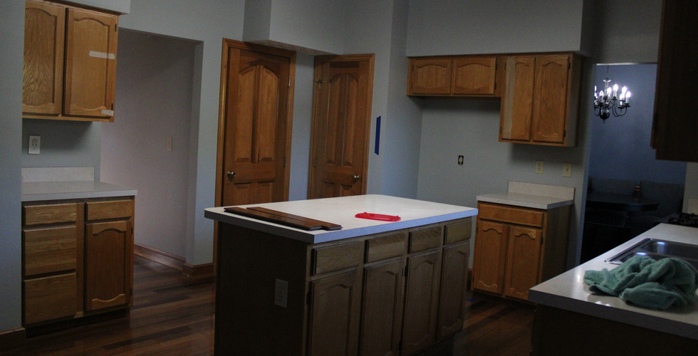 Before image of kitchen with full view of soffits