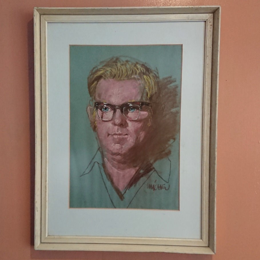 Pastel portrait of a man in glasses