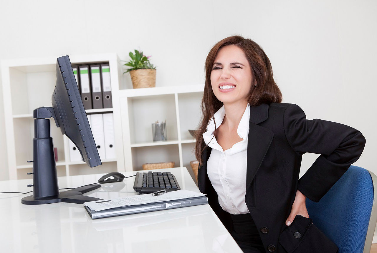 istock_businesswoman-with-back-pain