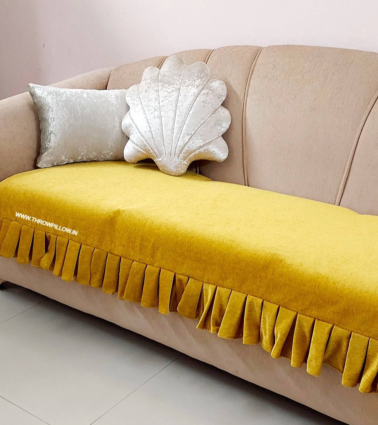Mustard Sofa Cover with Pleated Fringe Design for Living Room Decor.