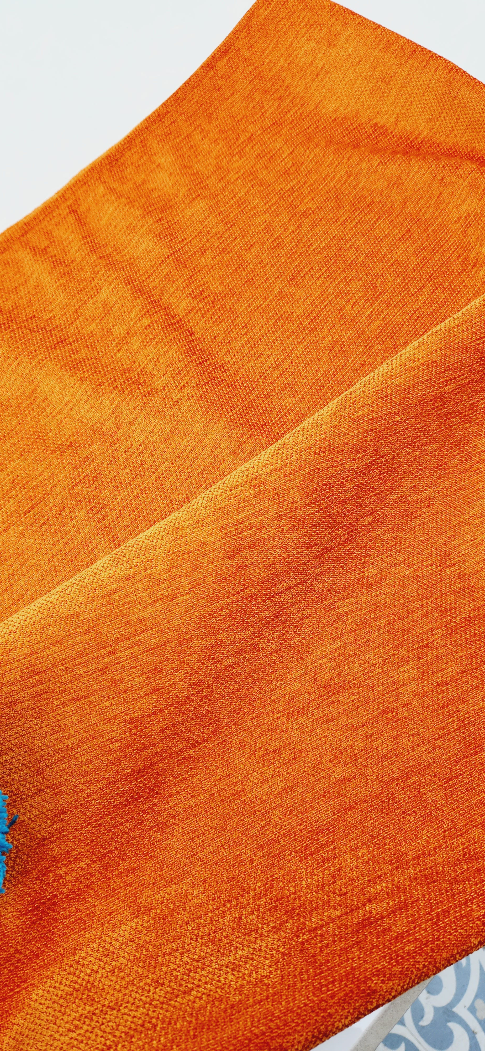 "Customised sofa cover made from premium quality Burnt Orange fabric"