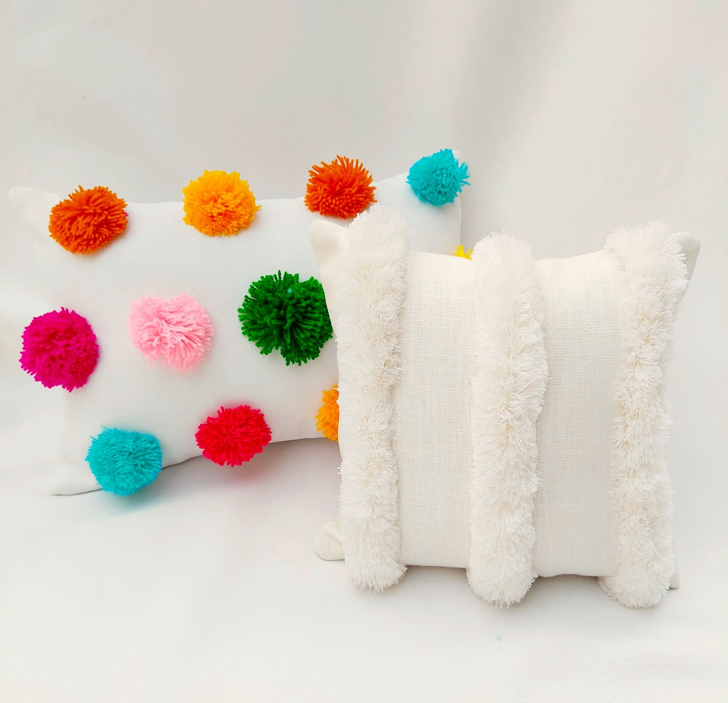 Elegant off-white square cushion cover with tufted pattern