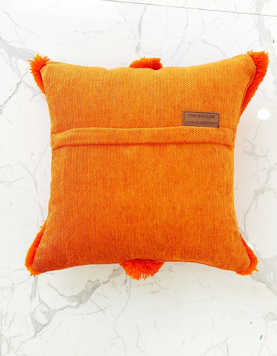 Warm and Inviting Orange Criss Cross Tufted Pillow