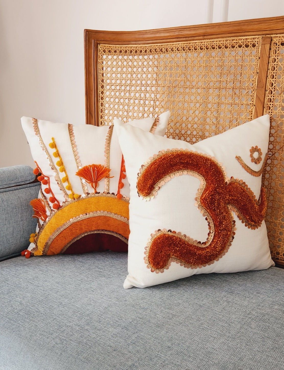 High-Quality Cushion Cover with Om Symbol Tufting and Gold Sequin Lace Embellishment.