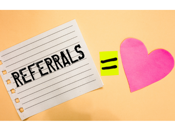 note with "referrals equals love"