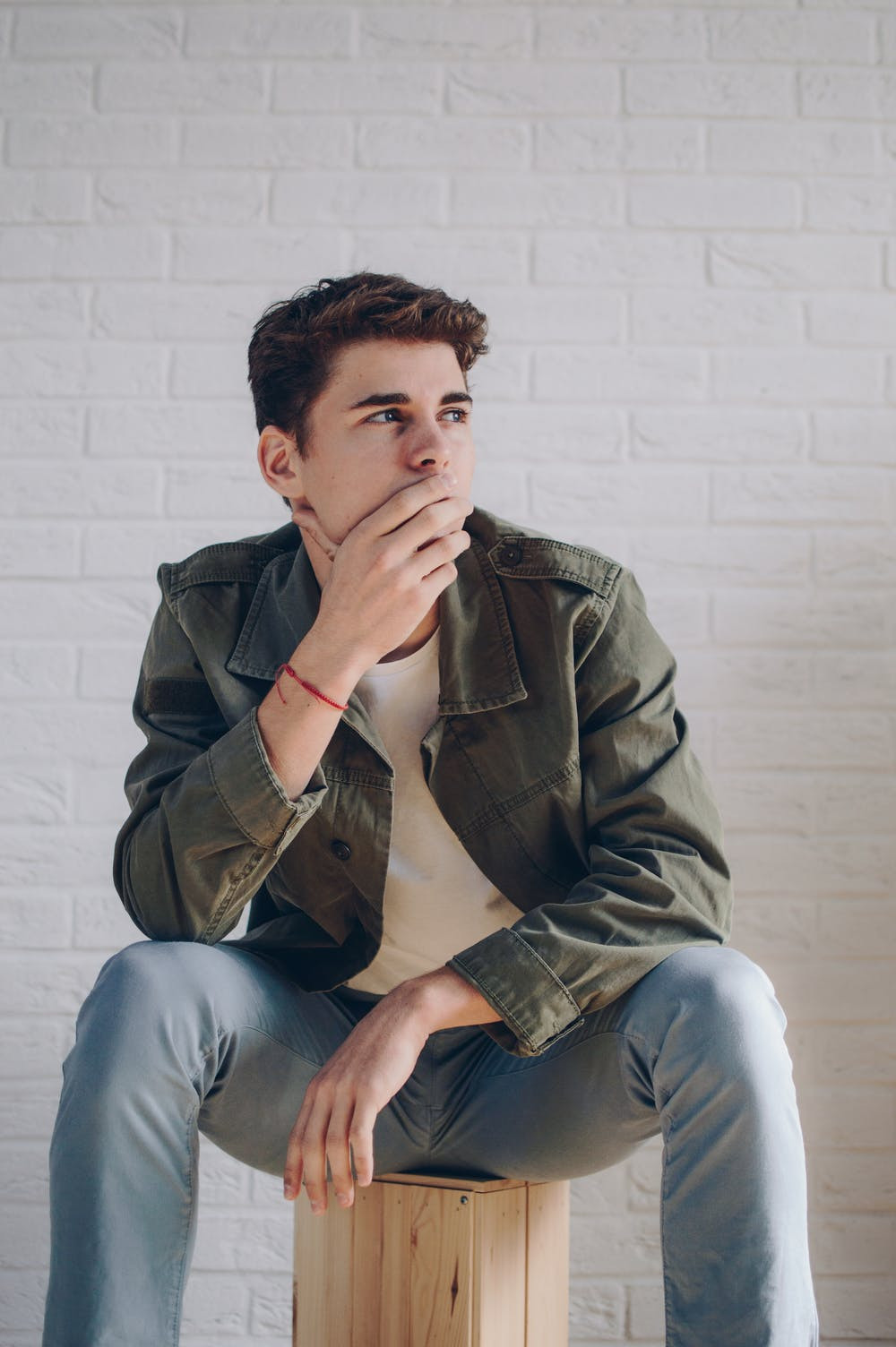 student pondering and thinkiing