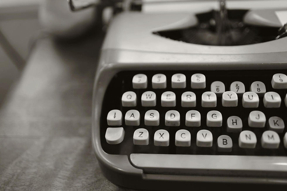A black and white picture of a modern typewriter