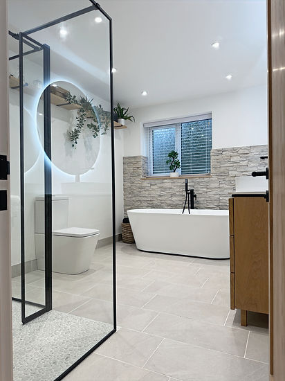 bathroom renovation in stoke on trent featuring wet room shower, bespoke vanity unit and stone feature wall