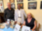 Dave Weinstein, Michael Martin, and Patricia Kazmierowski (left to right) staff the historical society table.