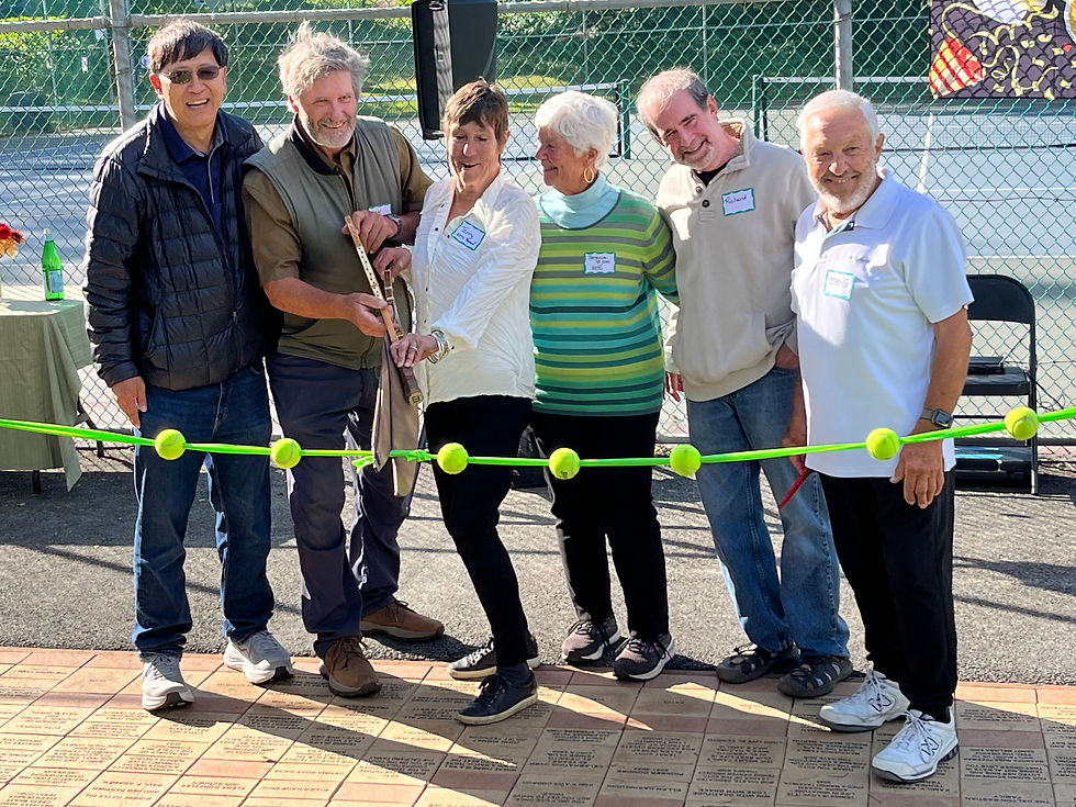 Members of the tennis center committee are (left to right) Rich Wong, Andy Dickey, Terry Cort, Patricia St. John, Richard Rosenthal, and Bob Guletz. Not shown: Suzy Stephens and Ellen Deneef