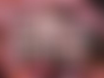 Hands holding a face back which is screaming impacted by negativity