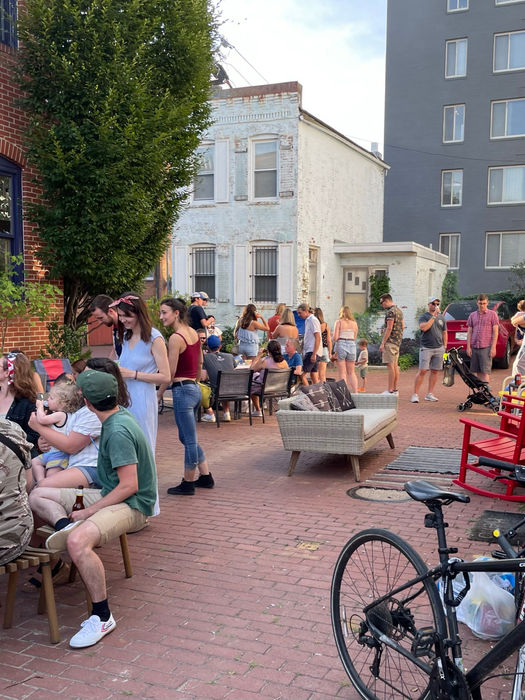 The Mews come alive during a July 4 gathering. (D. Vogt, July 2022) 