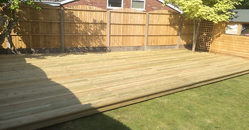 Wooden decking and decorative panel fence with concrete posts and gravelboards. Cheap, value for money, quality, experienced, professional. Dorset, Bournemouth, Christchurch, Poole, Ferndown, Wimborne, Ringwood, Boscombe, Parkstone, Southborne, Winton, Charminster, Corse Mullen, Broadstone, Westborne, Bearwood, Verwood, Canford Heath, Upton, Wareham, Lymington, New Milton, Lynhurst, Brockenhurst, Burley, New Forest, Fordingbridge.