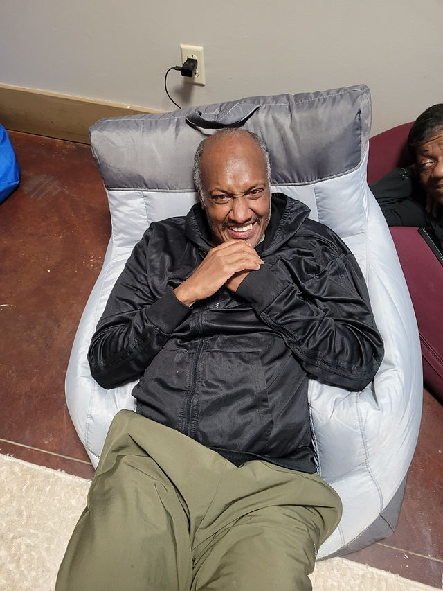 enjoying the sensory room at Camp Conquest