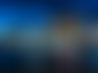 Singapore skyline at night with Marina Bay Sands and domed gardens lit up. Blue sky, city lights reflecting on the water create a vibrant mood.