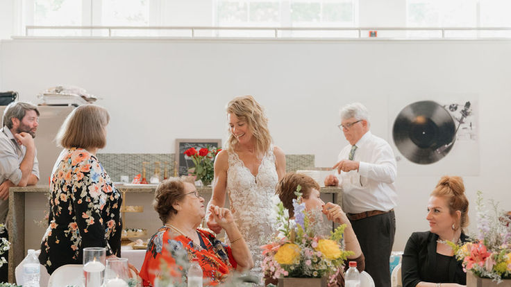 Guests enjoying wedding reception meal