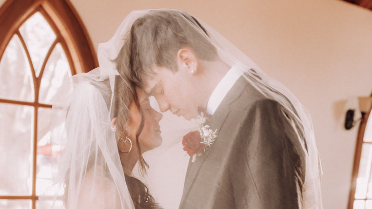 Wedding ceremony at Little Shawnee Chapel in Shawnee Kansas
