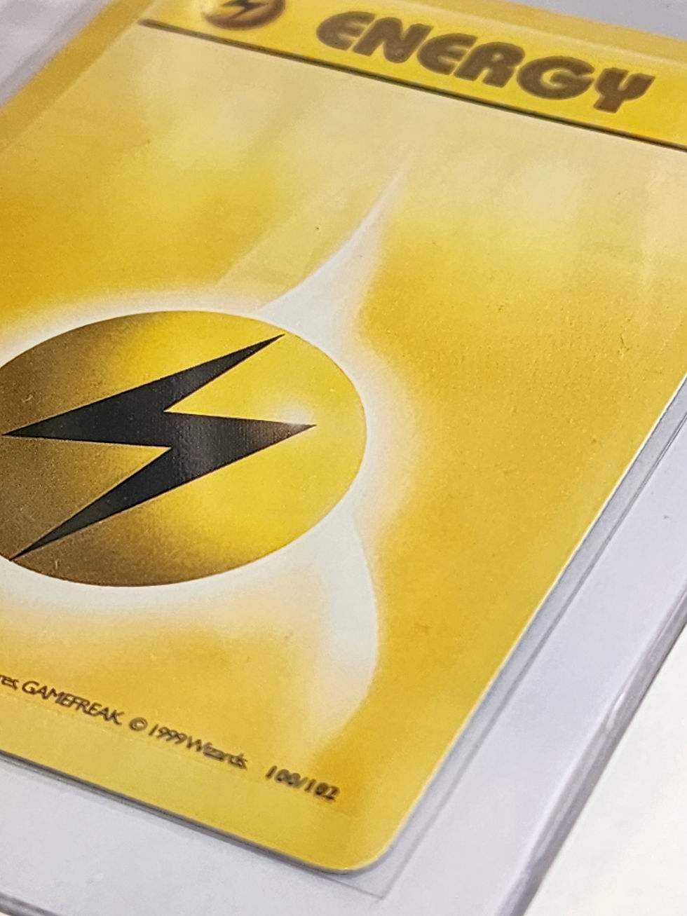 Front of Pokémon Lightning Energy 100/102 Base Set 1st Edition