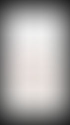 Stylized map with colorful houses, trees, car, and a clock tower. Text above reads "Freaky Friday Files: Paper Towns" with website link below.