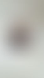 Woman smiling, resting head on hand in a room. Text around reads: "2026 INS," "Putting my health first," "Simple skincare," "Embracing my curly hair."