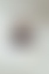 Woman smiling, resting head on hand in a room. Text around reads: "2026 INS," "Putting my health first," "Simple skincare," "Embracing my curly hair."