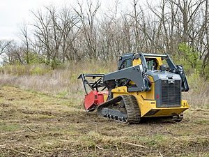 skid steer with a mulcher