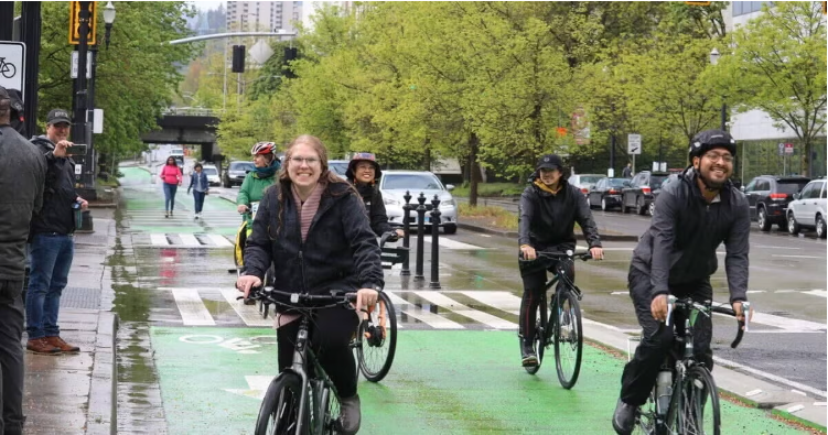Portland residents who get around by bicycle, even on rainy days.