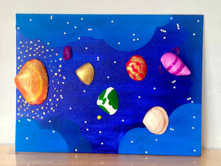 Planet artwork made from seashells