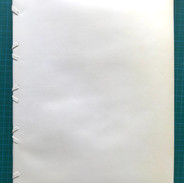 Confection d'une reliure de conservation de type Espinoza pour document restauré