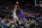 Houston guard Kingston Flemings attempts a contested jump shot against Kansas in the Big 12 Tournament.