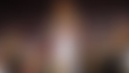 Tucker DeVries of the Indiana Hoosiers attempts a layup while being guarded during a college basketball game.