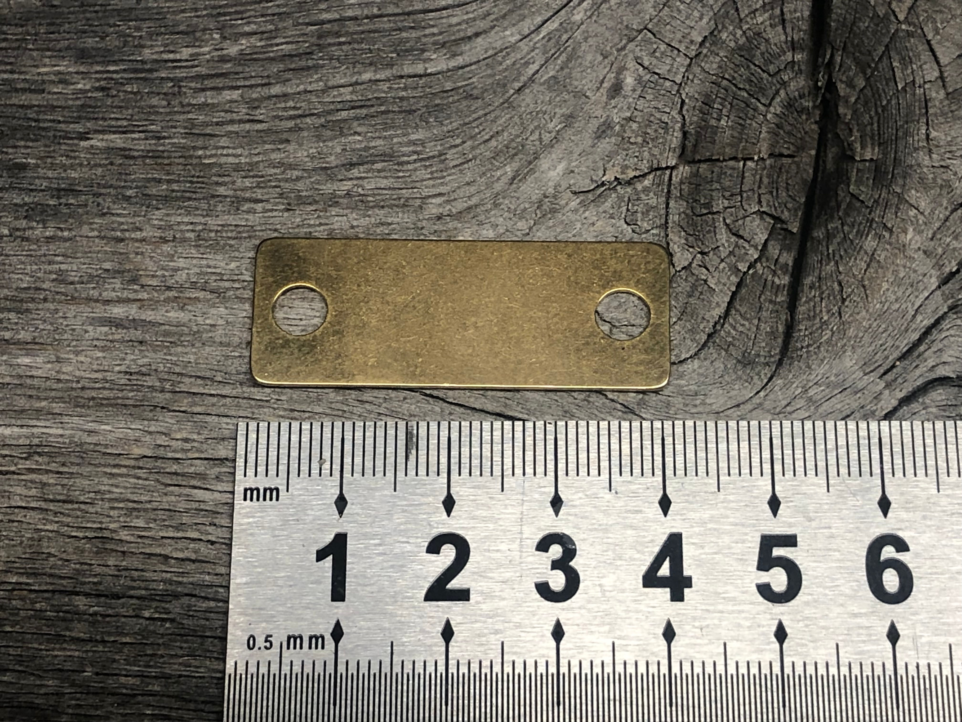 Merkeskilt 40x15x0,85 mm messing