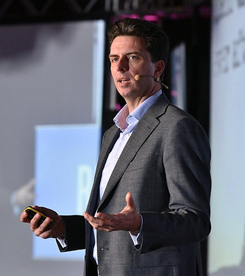 Spencer Waldron, Founder of Cenrox speaking at business conference