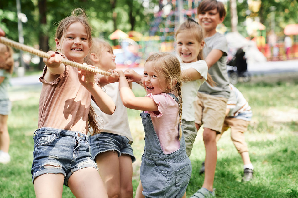 happy-children-playing-tug-of-war-outdoors-2026-03-16-01-24-50-utc (1).jpg