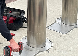 a hoses unlimited technician repairing a hydraulic bollard