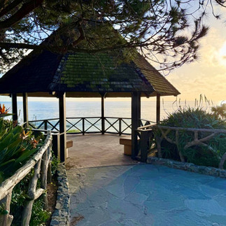 Gazebo overlooking the ocean at sunset in Laguna Beach.