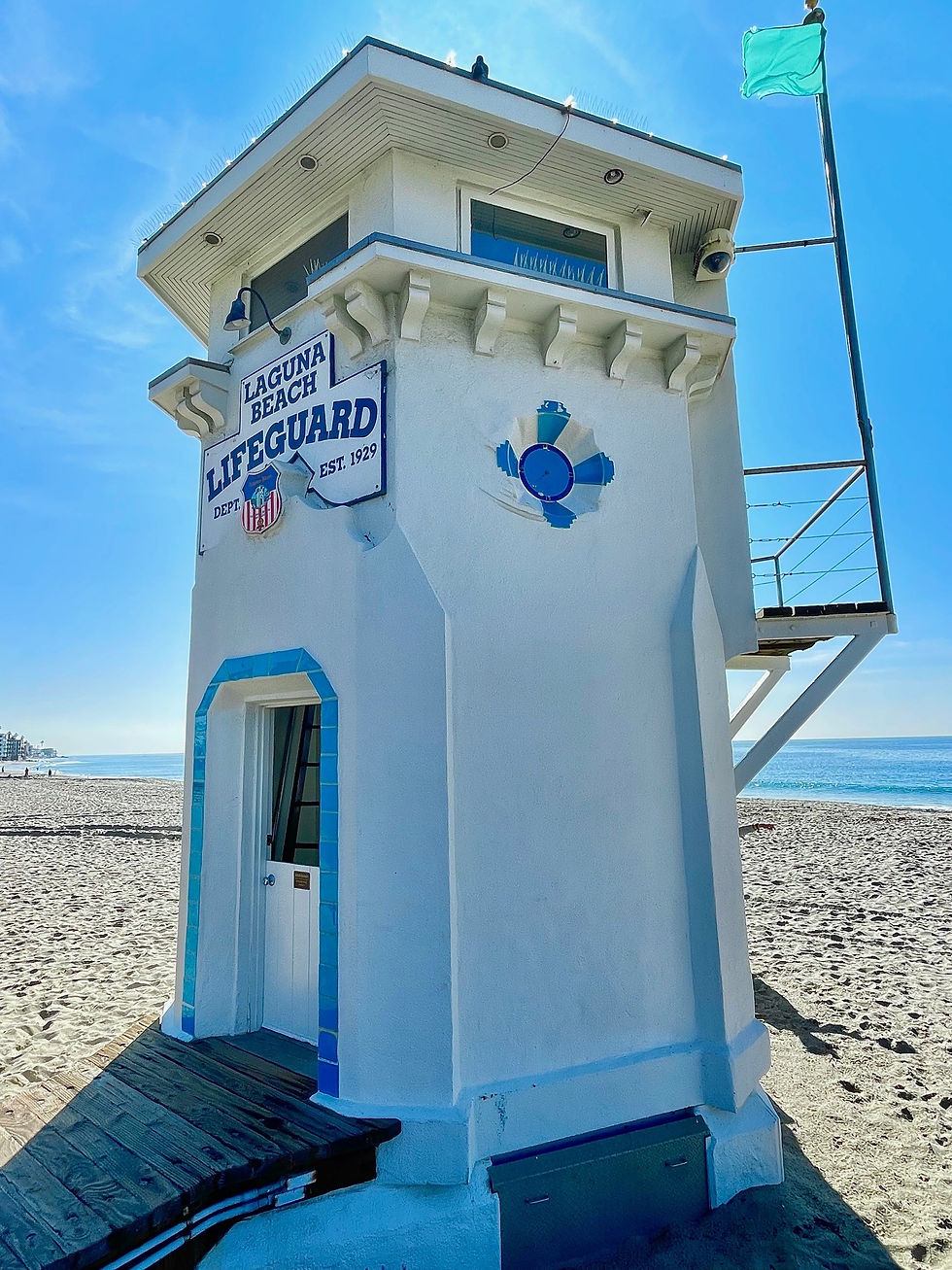 Thumbnail: Blue and white Laguna Beach lifeguard tower featured in the local travel guide