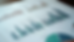 Close-up view of a diversified investment portfolio with stocks, bonds, and mutual funds