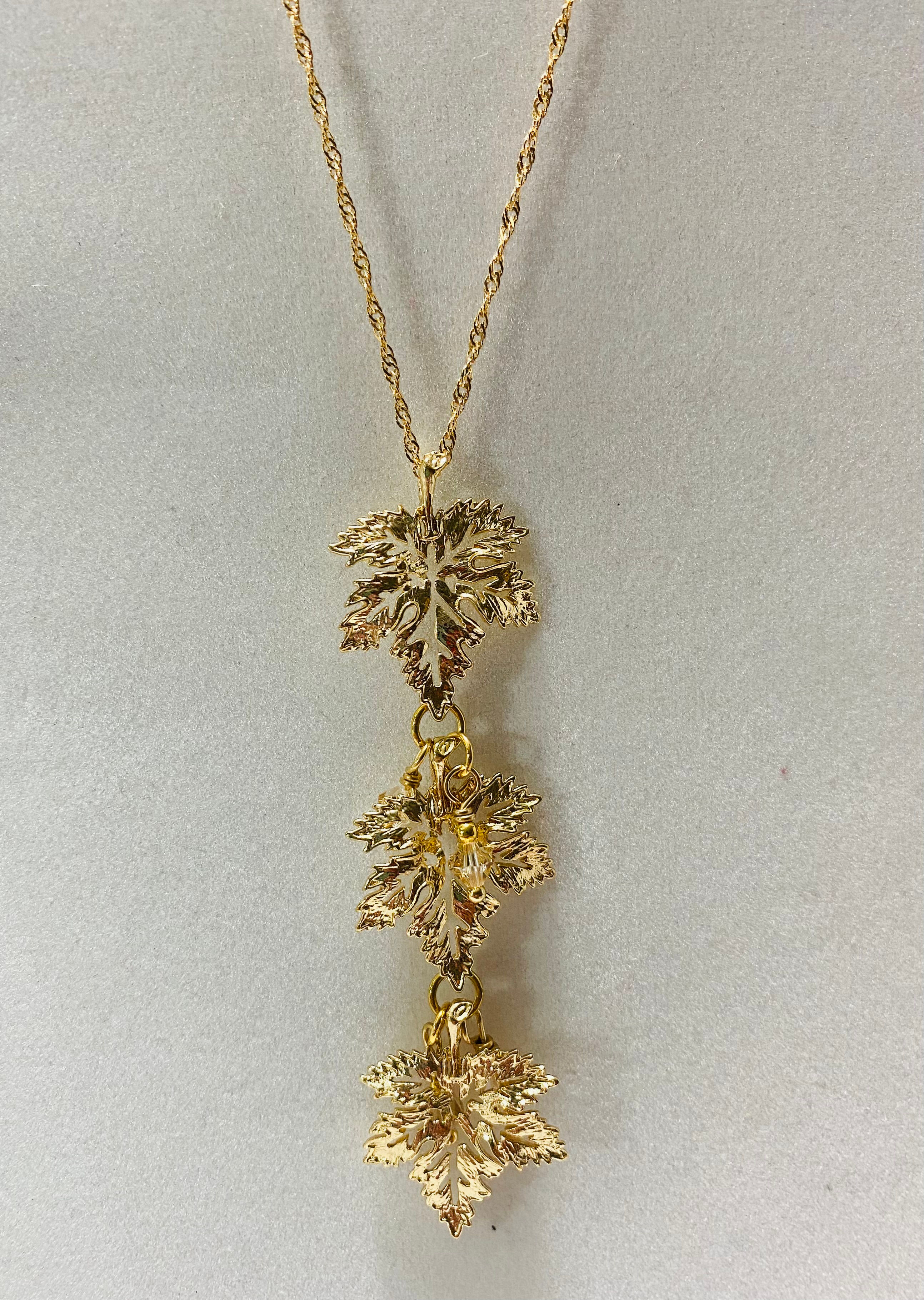 3 gold plated maple leaves and Swarovski champagne bicones E130