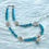 Thumbnail: Aria Blue Beaded Necklace with Shell, Turquoise