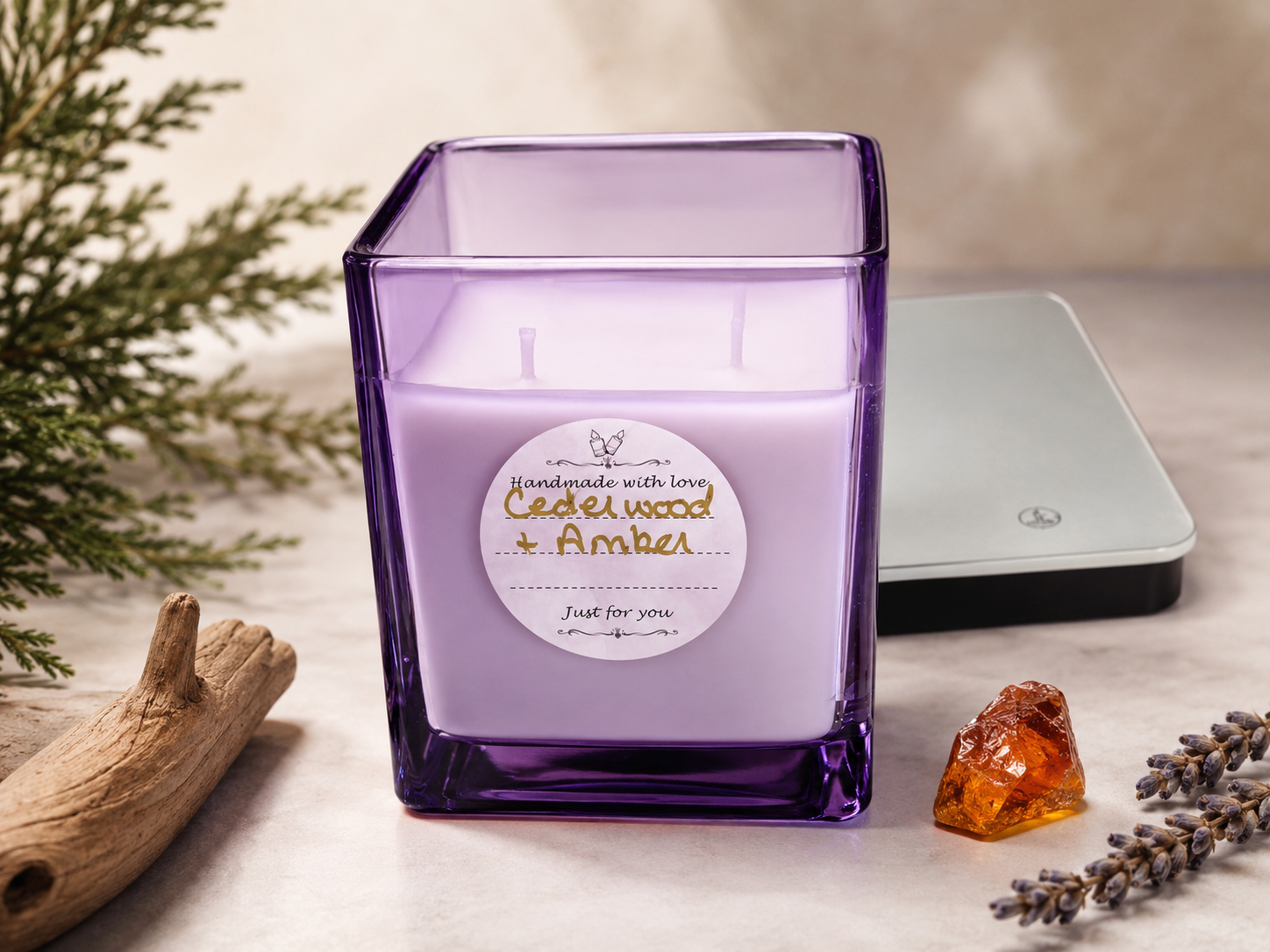Cedarwood and Amber 50oz candle in a purple glass jar